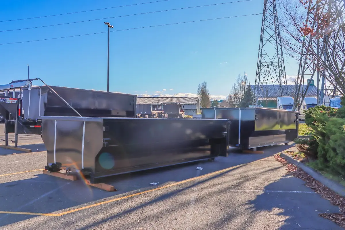 Roll-off dumpster ready for waste disposal at job site for Estate Cleanout Dumpster Rental in Tisbury